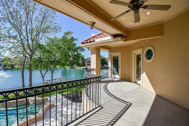 2 Royal Hampton Ct, Sugar Land, TX 77479 - view of patio / terrace with ceiling fan, a water view, and a balcony