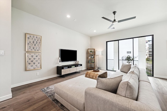 living area featuring baseboards, recessed lighting, a ceiling fan, visible vents, and wood finished floors