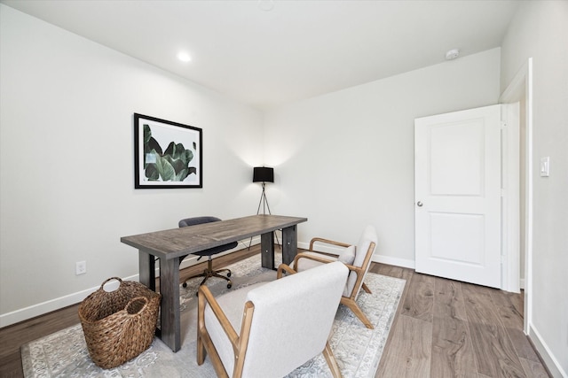 home office with wood finished floors, baseboards, and recessed lighting