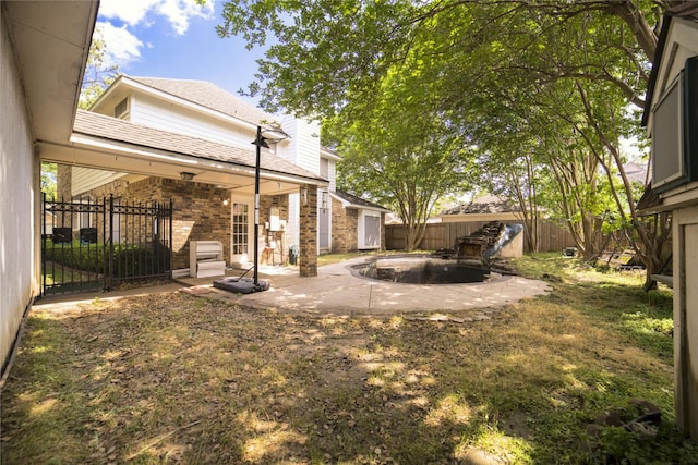 view of yard with a patio and a fenced backyard