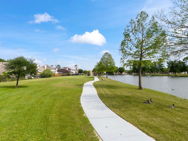 8322 Calico Canyon Dr, Tomball, TX 77375 - view of property's community featuring a water view, a lawn, and a residential view