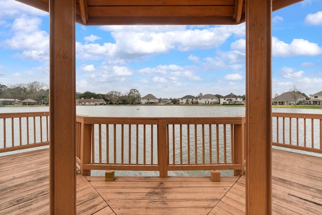 8322 Calico Canyon Dr, Tomball, TX 77375 - deck with a residential view and a water view