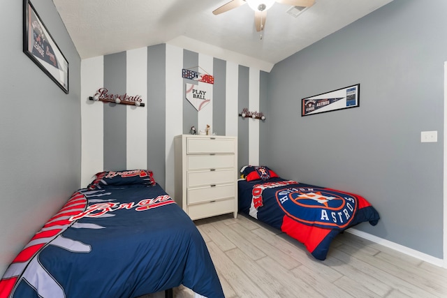 8322 Calico Canyon Dr, Tomball, TX 77375 - bedroom with wood finished floors and ceiling fan
