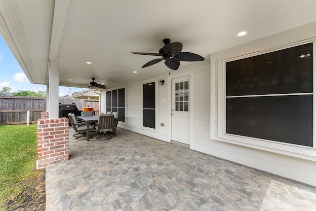 8322 Calico Canyon Dr, Tomball, TX 77375 - view of patio / terrace with a ceiling fan, fence, and outdoor dining area