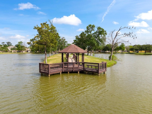 8322 Calico Canyon Dr, Tomball, TX 77375 - dock with a gazebo, a water view, and a lawn