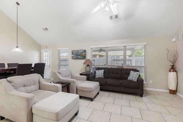 8322 Calico Canyon Dr, Tomball, TX 77375 - living room with plenty of natural light, baseboards, ceiling fan, light tile patterned floors, and high vaulted ceiling