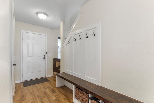6803 Cortenridge Ln, Houston, TX 77048 - mudroom featuring light wood finished floors and baseboards