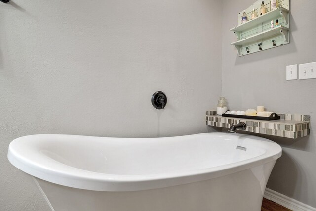 310 Hidden Oaks Dr, Point Blank, TX 77364 - bathroom featuring a freestanding bath