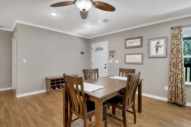 310 Hidden Oaks Dr, Point Blank, TX 77364 - dining room featuring baseboards, light wood-style flooring, visible vents, and ceiling fan