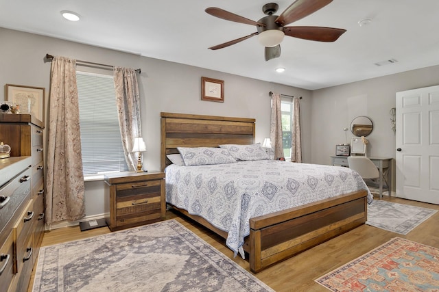 310 Hidden Oaks Dr, Point Blank, TX 77364 - bedroom with a ceiling fan, light wood-style flooring, baseboards, visible vents, and recessed lighting