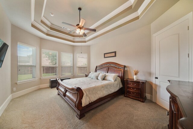 3225 Summer Tanager Ln, Manvel, TX 77578 - carpeted bedroom with crown molding, a tray ceiling, baseboards, and ceiling fan