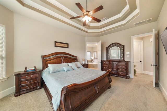 3225 Summer Tanager Ln, Manvel, TX 77578 - bedroom featuring a tray ceiling, ornamental molding, light colored carpet, and baseboards