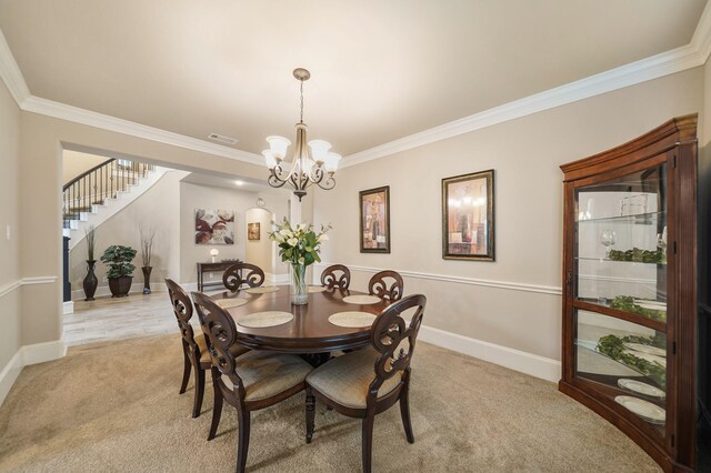 3225 Summer Tanager Ln, Manvel, TX 77578 - dining room with light colored carpet, crown molding, stairs, baseboards, and a chandelier