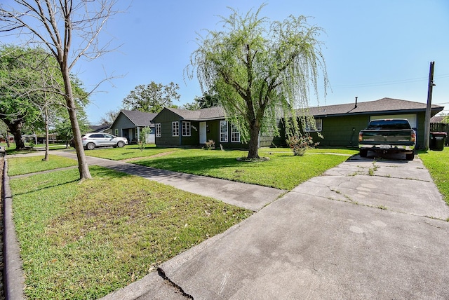 1905 Tennessee St, Baytown, TX 77520 - single story home with concrete driveway and a front yard