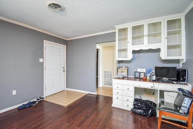 1905 Tennessee St, Baytown, TX 77520 - office area with visible vents, baseboards, and wood finished floors