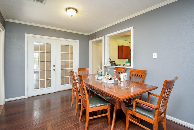 1905 Tennessee St, Baytown, TX 77520 - dining space featuring visible vents, baseboards, ornamental molding, wood finished floors, and french doors