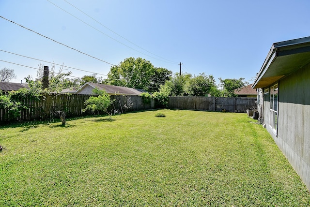 1905 Tennessee St, Baytown, TX 77520 - view of yard with a fenced backyard