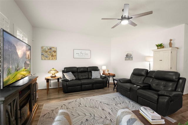 1143 Grand Junction Dr, Tomball, TX 77375 - living room with ceiling fan, baseboards, and wood finished floors