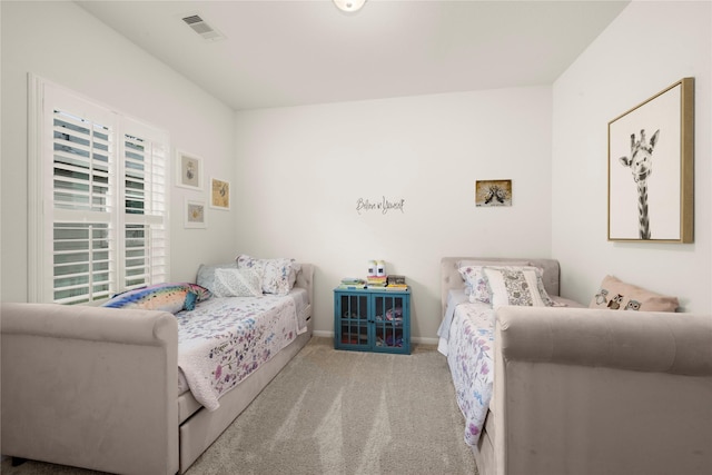 1143 Grand Junction Dr, Tomball, TX 77375 - carpeted bedroom with baseboards and visible vents