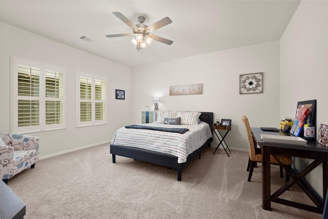 1143 Grand Junction Dr, Tomball, TX 77375 - bedroom with carpet floors, visible vents, baseboards, and ceiling fan