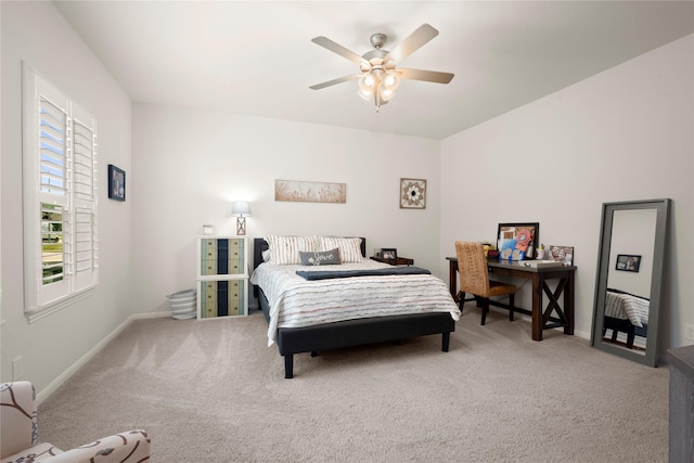 1143 Grand Junction Dr, Tomball, TX 77375 - carpeted bedroom with a ceiling fan and baseboards