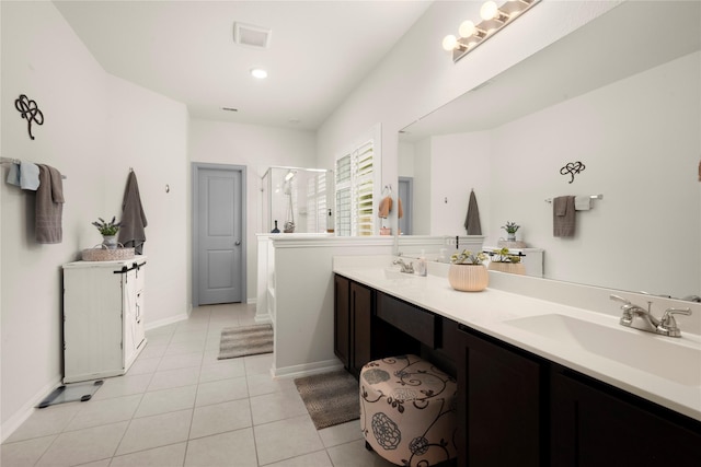 1143 Grand Junction Dr, Tomball, TX 77375 - bathroom with tile patterned floors, a sink, a shower stall, and double vanity
