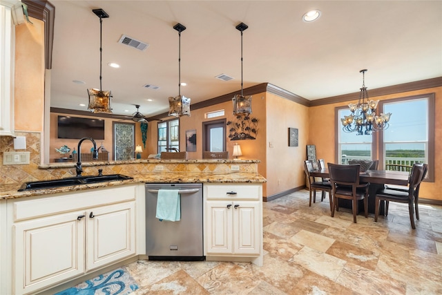 206 China Clipper Dr, Freeport, TX 77541 - kitchen featuring an inviting chandelier, stainless steel dishwasher, visible vents, a sink, and baseboards