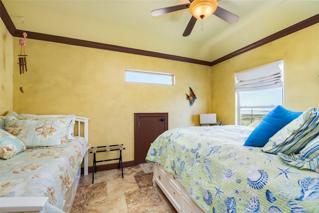 206 China Clipper Dr, Freeport, TX 77541 - bedroom with ornamental molding, ceiling fan, and stone finish floor