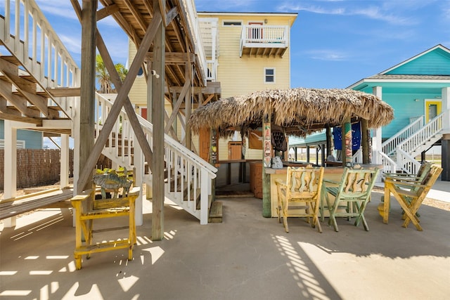 206 China Clipper Dr, Freeport, TX 77541 - view of patio / terrace featuring stairs