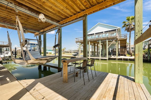 206 China Clipper Dr, Freeport, TX 77541 - view of dock featuring a water view and boat lift
