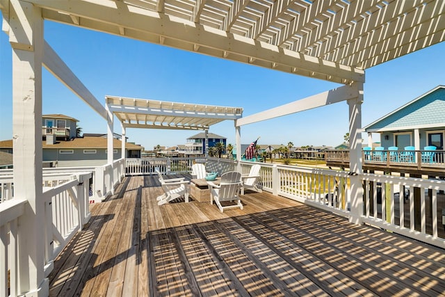 206 China Clipper Dr, Freeport, TX 77541 - deck featuring a pergola and a residential view