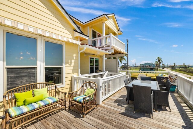 206 China Clipper Dr, Freeport, TX 77541 - wooden terrace featuring outdoor dining area