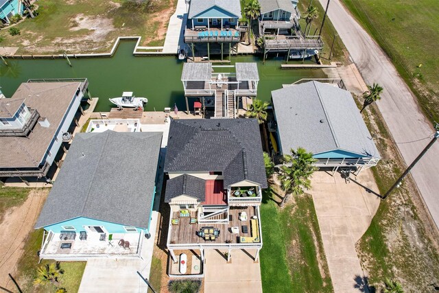 206 China Clipper Dr, Freeport, TX 77541 - birds eye view of property featuring a water view and a residential view