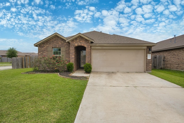 single story home with concrete driveway, a front yard, brick siding, a garage, and fence