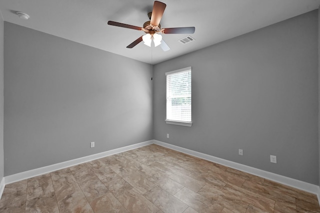 114 Winecup Cir, Montgomery, TX 77316 - unfurnished room featuring visible vents, baseboards, and ceiling fan