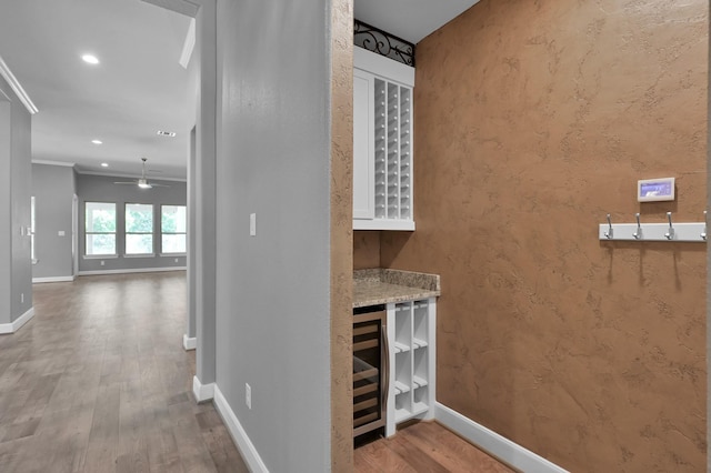 114 Winecup Cir, Montgomery, TX 77316 - bar featuring recessed lighting, wood finished floors, crown molding, baseboards, and ceiling fan