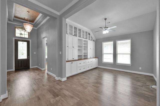 114 Winecup Cir, Montgomery, TX 77316 - entrance foyer featuring visible vents, baseboards, ornamental molding, dark wood finished floors, and ceiling fan with notable chandelier