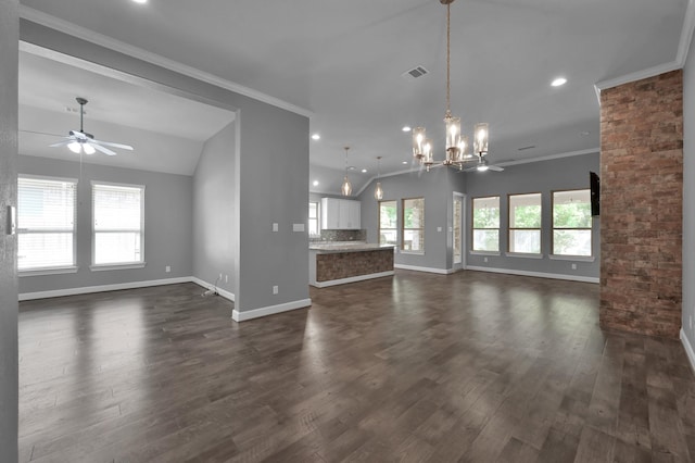 114 Winecup Cir, Montgomery, TX 77316 - unfurnished living room featuring dark wood finished floors, baseboards, and ceiling fan with notable chandelier