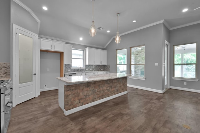 114 Winecup Cir, Montgomery, TX 77316 - kitchen featuring white cabinets, stainless steel appliances, tasteful backsplash, and crown molding