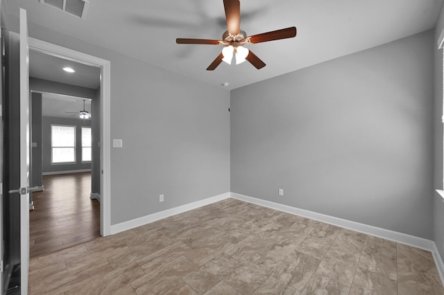 114 Winecup Cir, Montgomery, TX 77316 - unfurnished room featuring baseboards, a ceiling fan, and visible vents