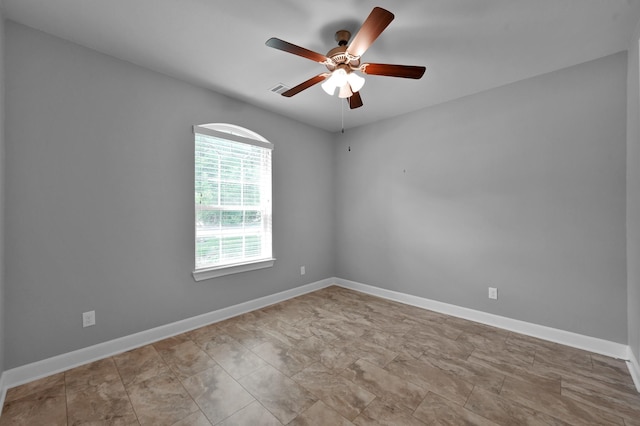 114 Winecup Cir, Montgomery, TX 77316 - spare room with visible vents, a ceiling fan, and baseboards