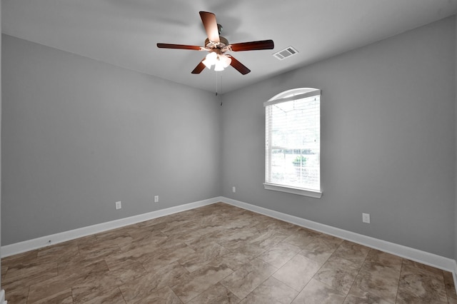 114 Winecup Cir, Montgomery, TX 77316 - unfurnished room with baseboards, a ceiling fan, and visible vents
