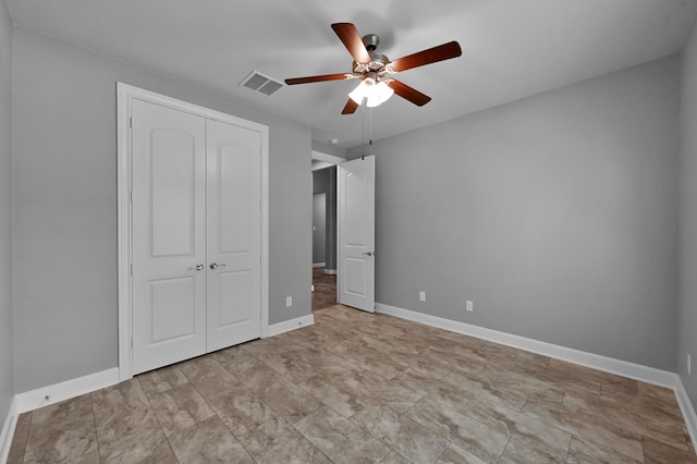 114 Winecup Cir, Montgomery, TX 77316 - unfurnished bedroom featuring a closet, baseboards, a ceiling fan, and visible vents