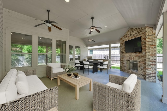114 Winecup Cir, Montgomery, TX 77316 - view of patio / terrace with an outdoor living space with a fireplace, outdoor dining space, fence, and ceiling fan
