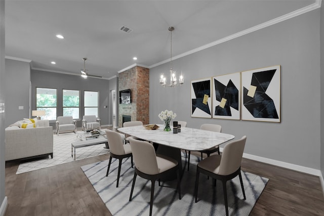 114 Winecup Cir, Montgomery, TX 77316 - dining area featuring wood finished floors, visible vents, recessed lighting, and crown molding
