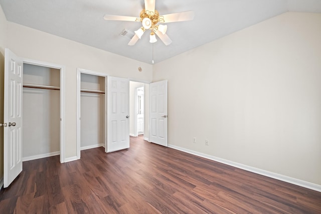 6214 Laguna Del Rey Dr, Houston, TX 77041 - unfurnished bedroom with baseboards, ceiling fan, multiple closets, vaulted ceiling, and wood finished floors
