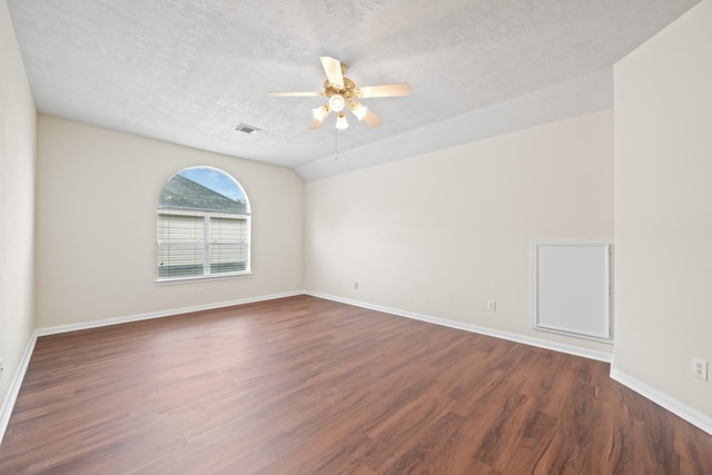 6214 Laguna Del Rey Dr, Houston, TX 77041 - empty room featuring ceiling fan, a textured ceiling, visible vents, dark wood-style flooring, and baseboards
