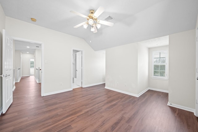 6214 Laguna Del Rey Dr, Houston, TX 77041 - unfurnished bedroom featuring dark wood-type flooring, visible vents, baseboards, and vaulted ceiling