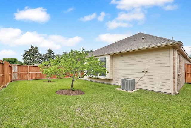 view of yard featuring a fenced backyard and cooling unit