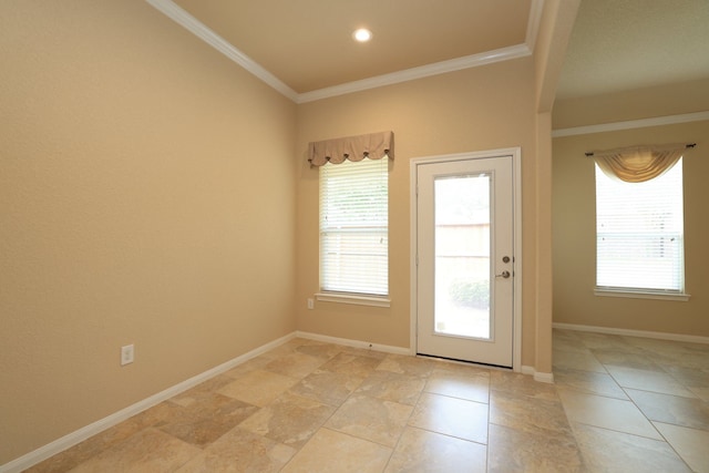 entryway featuring a healthy amount of sunlight, baseboards, ornamental molding, and recessed lighting